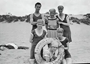 Bridport: Holidaymakers on a beach