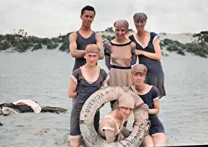 Bridport: Holidaymakers on a beach