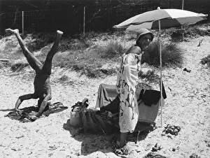 Holidaymaker: Holidaymakers on a beach