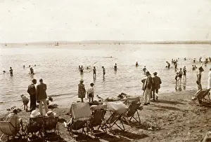 Deckchairs: Holidaymakers on the beach at Torquay, Devon