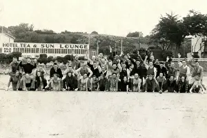 Holidaymakers: Holidaymakers enjoy a group photograph on the beach