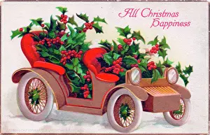 Holly in a car on a Christmas postcard