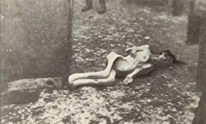 Starved: Holocaust: Dead body lying on the ground outdoors