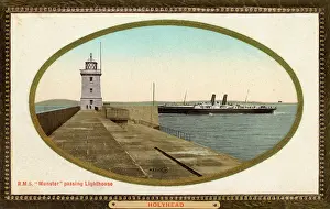 Holyhead: Holyhead, Wales - R.M.S Munster passing the lighthouse