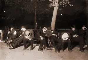 Depressions: Homeless men sleeping on a park bench in ?