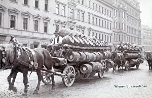 Hors: Two hors-drawn carriages with beer-barrels