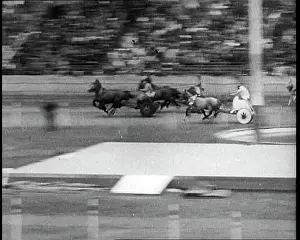 Chariots: Three Horse Chariots Racing Around a Circuit
