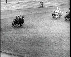 Chariots: Three Horse Chariots Racing Around a Circuit