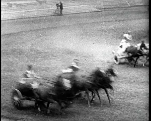 Chariots: Three Horse Chariots Racing Around a Circuit