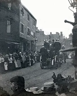 Pavements: A Horse-drawn Fire Engine pulls quite a crowd