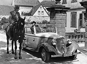 Convertible: Horseman and car, 1930