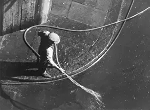 Hosing: Hosing down a street