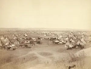 Traditionalist: Hostile Indian camp of tipis, horses, and wagons