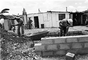 Plastering: a house is built in Oukasie township, brits. North