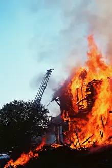 Risking: House fully engulfed in flames fire