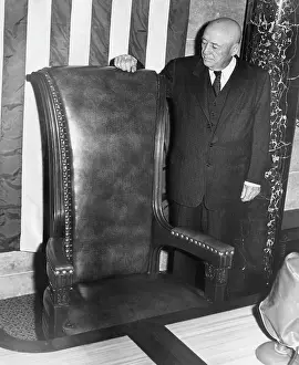 Rayburn: House Speaker Sam Rayburn, looks over his ?