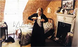 Garret: HOUSEMAID GETS DRESSED