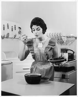 Frilly: Housewife in the kitchen, c.1960