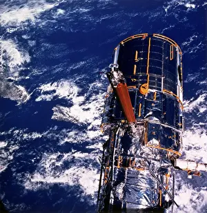 Telescope: Hubble Space Telescope above the Earth. NASA