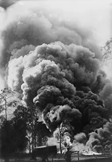 Hydrocarbons: Huge oil gusher fire billows a monstrous column