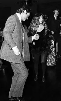 Barbi: Hugh Hefner and Barbi Benton dance at a ?