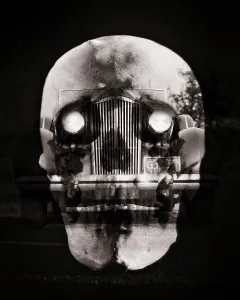Specter: Human Skull Superimposed on Front Grill of an