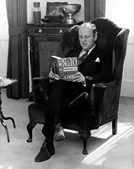 Humphry: Humphrey Berkeley MP in his London flat, reading a book