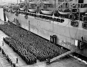 50000: Hundreds of German POWs, under guard beside an