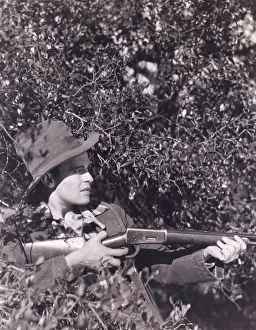 Trapping: Hunter hiding in the bushes