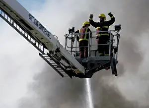 Penge: A hydraulic lift in action at scene of fire, Penge