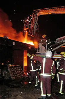 Carshalton: Hydraulic platform at work on fire at commercial premises