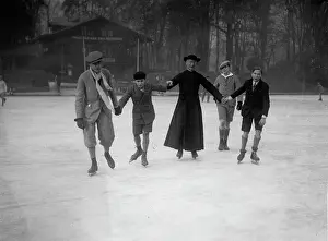 Cassock: An iceskating priest wearing his cassock