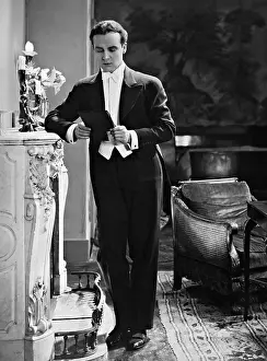 Costs: Igo Sym in What costs love, 1930