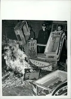 Supervises: Illegal gaming machines destroyed, Scotland Yard, London