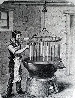 Figuier: Illustration showing Making dips for candles