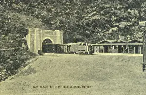 Kalka: India - Train coming out of the tunnel at Barog