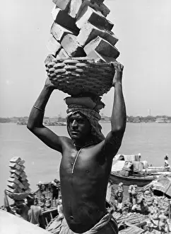 Plaited: Indian coolie on the Ganges, 1940