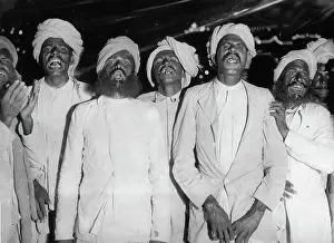 Eaters: Indian fire-eaters. Each holds a piece