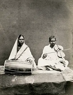 Portrtait: Indian musicians, drums and stringed instrument