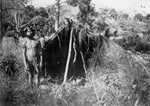 Erstwhile: Indigene man with his thatched hut