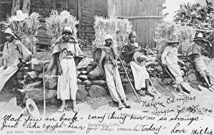 Sombreros: Indigenous Native Mexicans carrying Sugar Cane