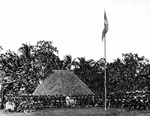 Spears: Indigenous people in front of a hut in Samoa