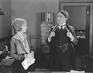 Irritated: Indignant boss staring at secretary