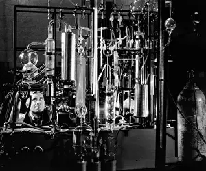 Labs: Industrial chemist among glass tubes in ?