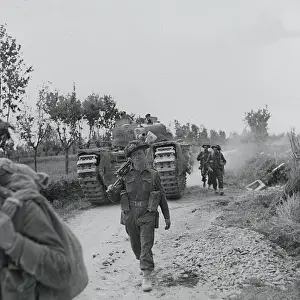 Relating: Infantry and supporting tanks advancing along the Argenta ro