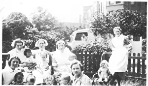 Informal: Informal outdoor group of nurses and children
