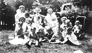 Informal: Informal outdoor group of nurses and children