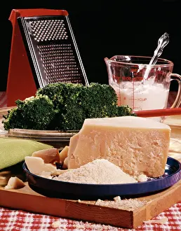 Cheeses: Ingredients for Cooking a Broccoli and Grated Cheese Dish