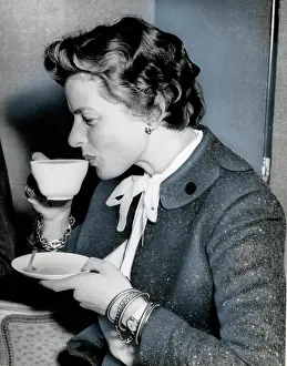Sipping: Ingrid Bergman enjoys a cup of tea