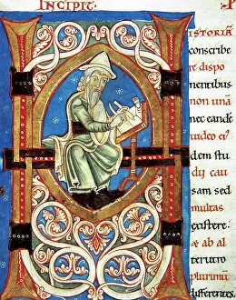 Lectern: Initial with image (amanuensis). Letter H. Manuscript. 15th